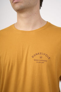 Polo Dunkelvolk SURF SCRIPT LOGO GLD
