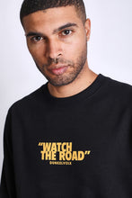 Cargar imagen en el visor de la galería, Polera para Hombre Dunkelvolk CREW NECK WATCH THE ROAD CREW FP BLK
