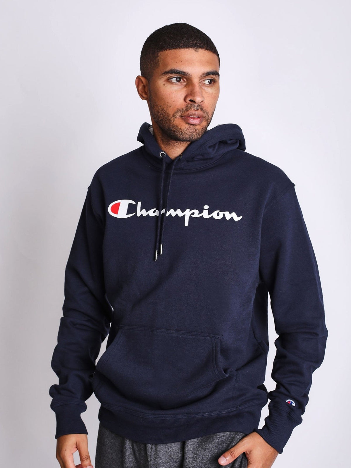 Polera para Hombre CHAMPION GF89HY06794 POWERBLEND GRAPHIC HOODIE NYC